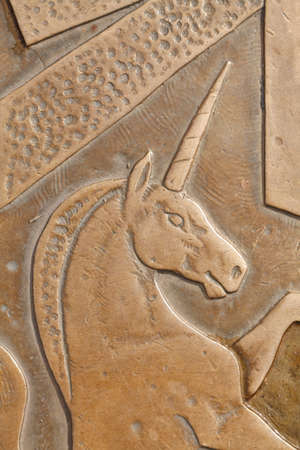 ground mark Unicorn, relief on pedestrian's wayの写真素材