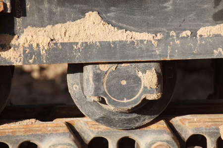 Chain Weels of an Excavator in the Sand