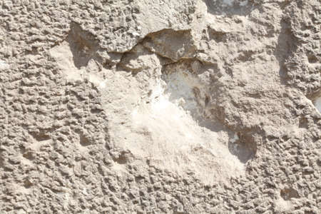 Shot holes on a house wall