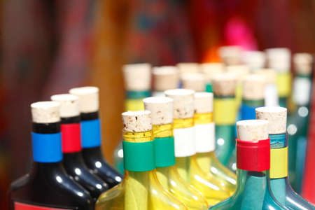 bottle corks on bottles in a souvenier shopの写真素材