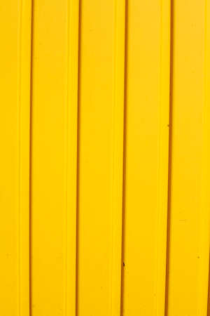 yellow metall texture with shadowsの写真素材