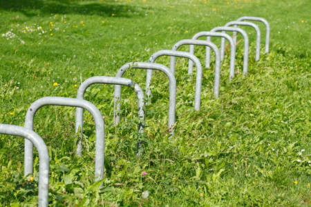 bicycle stand on a green meadowの写真素材