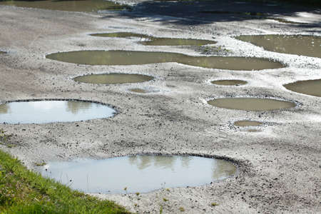 rain puddles on a padの写真素材