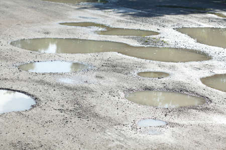 rain puddles on a padの写真素材