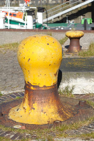 old yellow harbor pile
