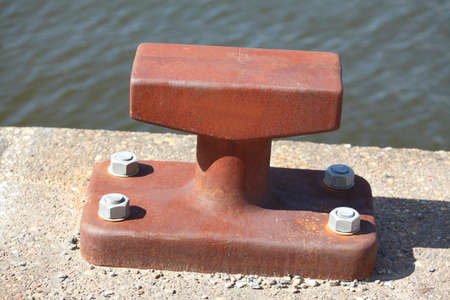 old rusty harbor pile