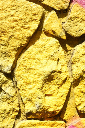 yellow colored brick wallの写真素材