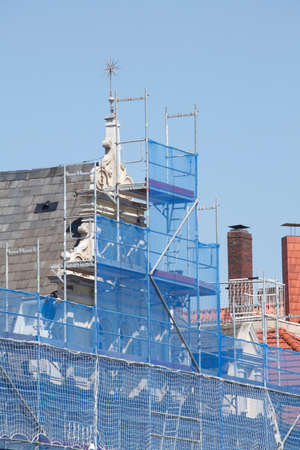Construction site, scaffold, roof, roof windows