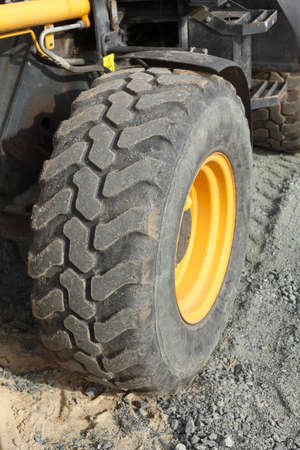 Profile of an excavator tyre on a Construction siteの写真素材