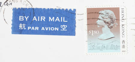 Poststamp and Poststmark By Air Mail on a Postcard, Hongkongの写真素材