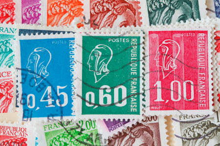 Colorful stamped old French stampsの写真素材