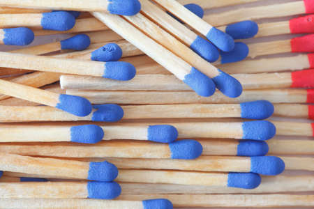 Matches with blue matchheads, background, textureの写真素材