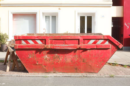 red Rubble Container on the street
