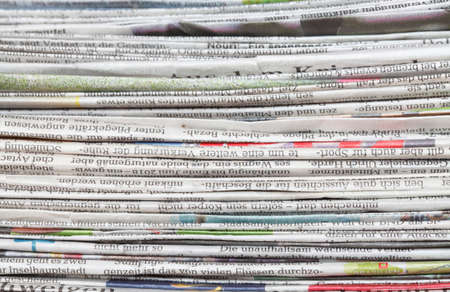 Newspaper pile of daily newspapers, background, textureの写真素材
