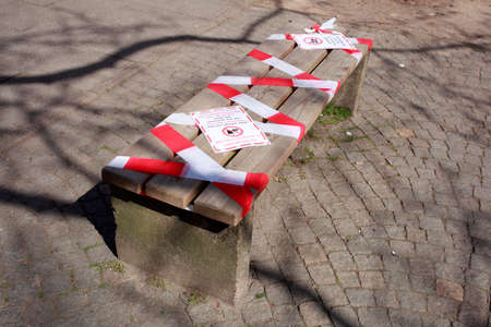 Barrier tape, bench locked due to corona virus, Germany, Europe