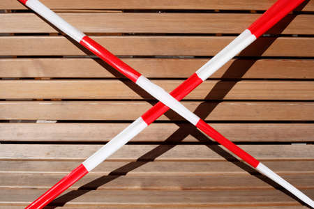 Barrier tape, bench locked due to corona virus, Germany, Europeの写真素材