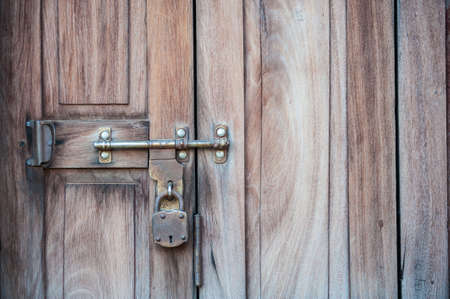 A key on the wooden wall の写真素材
