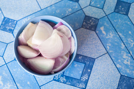 Sliced onion in the bowlの写真素材