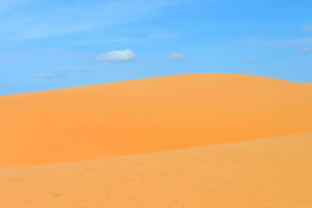 Sand dune and blue skyの写真素材