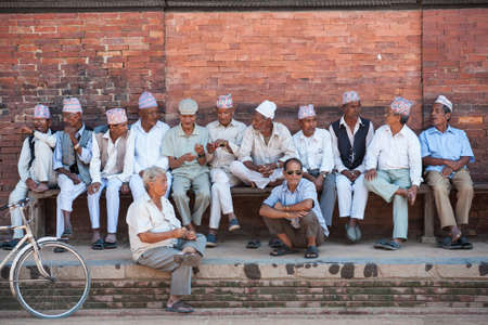 PATAN - SEPTEMBER 25   Group of unidentified old men besides the street of Patan, Nepal on September 25, 2012  Patan is best known for its rich cultural heritage, expecially its arts and crafts  のeditorial素材