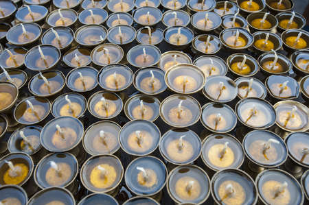 Candles around Boudhanath stupa in Kathmandu, Nepal の写真素材