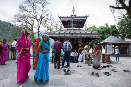 POKHARA, NEPAL - SEP 25   Nepali people visit the small temple in Pokhara, Nepal on September 25, 2012  Pokhara is one of the most popular tourist destinations in Nepal for trekking in the Himalayas  のeditorial素材