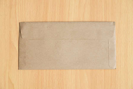 Brown letter on the tableの写真素材