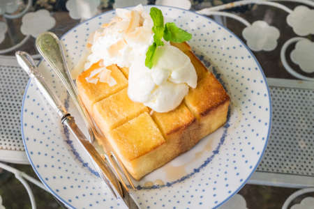Honey toast with Vanilla icecream and whipped cream