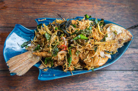 fired fish with fishsauce delicious thai foodの写真素材