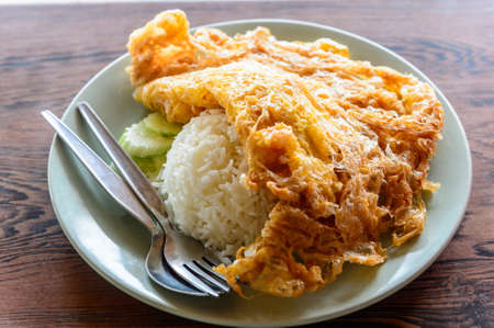 Thai fried egg with riceの写真素材