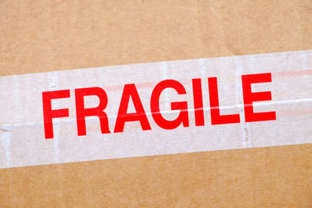 Fragile sticker on cardboard boxの写真素材