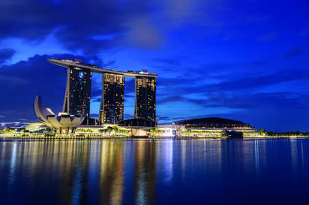 Cityscape of Singapore skyline at twilight time. Marina Bay is a bay located in the Central Area of Singaporeのeditorial素材