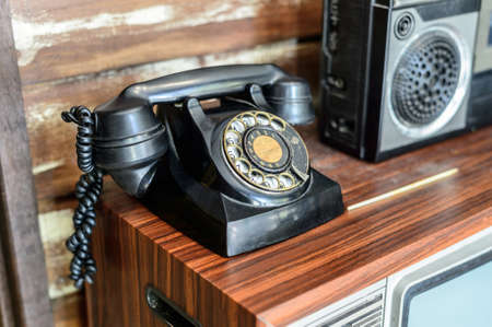 Old telephone on the tableの写真素材