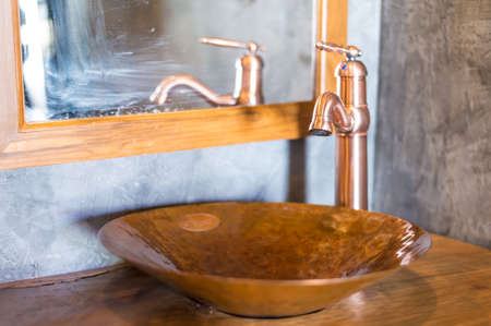 Close up of classic faucet and sink in bathroomの写真素材