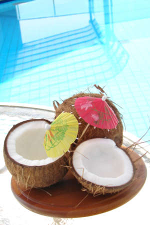 Coconuts by pool                              の写真素材