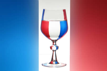 Glass of wine french flag as background           の写真素材
