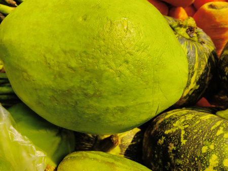 Pumpkin and other vegetables in the market, close-upの写真素材