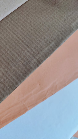 Crumpled brown and blue paper, can be used as backgroundの写真素材