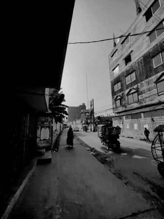 View of unknowns Nepali people walking on the street in Kathmandu in the afternoonの写真素材