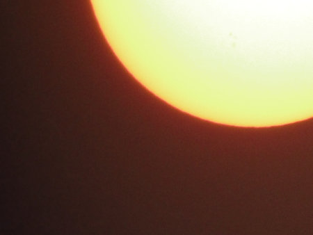 Sunset in the evening, close-up of a sun.の写真素材