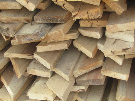 Pile of firewood in a shop, closeup of photo