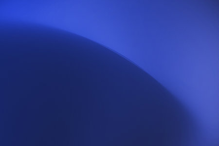 Blue abstract background with some smooth lines in it, close-upの写真素材