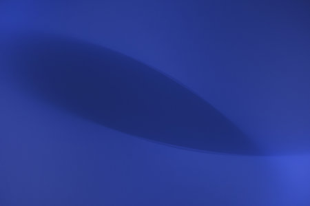 Blue abstract background with some smooth lines in it (shallow DOF)の写真素材