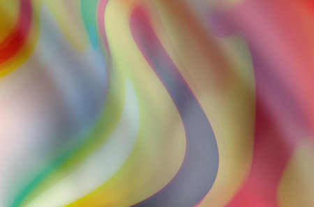 abstract background with smooth lines in yellow, red and green colorsの写真素材