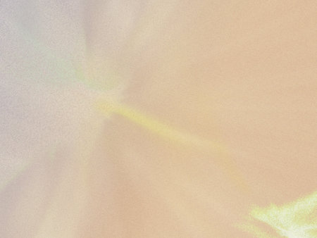 Abstract background with grunge texture in light brown and yellow colors.