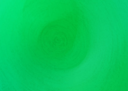 abstract green background texture with some smooth lines in it and gradientの写真素材