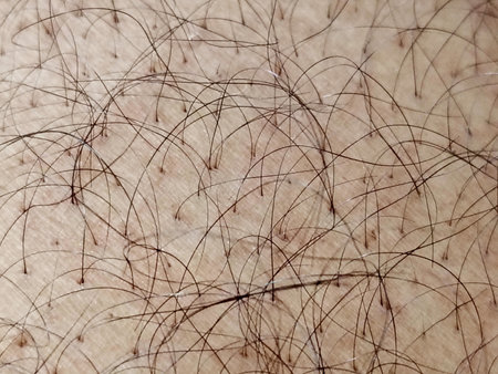 A detailed close-up of human skin showing fine hairs and natural lines. This image conveys texture, realism, and everyday body details suitable for skincare, dermatology, beauty, or wellness stock projects.の写真素材