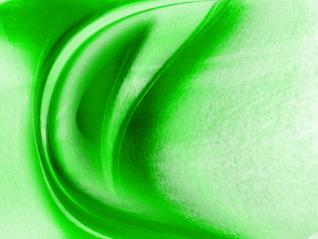 abstract green background texture with some smooth lines and highlights in itの写真素材