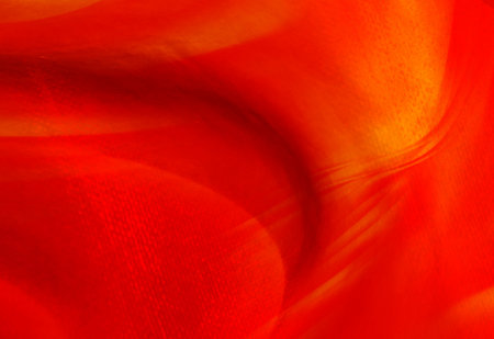 red yellow gradient shiny soft grain glitter abstract background with copy space. motion and soft texture surface, prefect for banner, poster, ads, cover page, web page and wallpaper designの写真素材