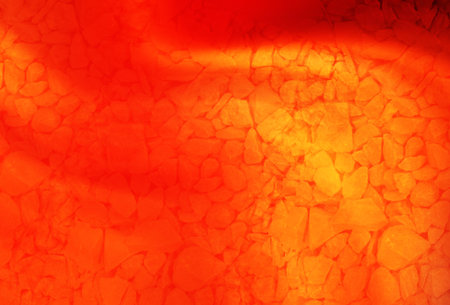 abstract orange background with bokeh defocused lights and shadowの写真素材